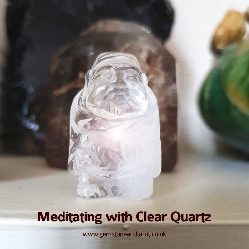 Meditating with clear Quartz